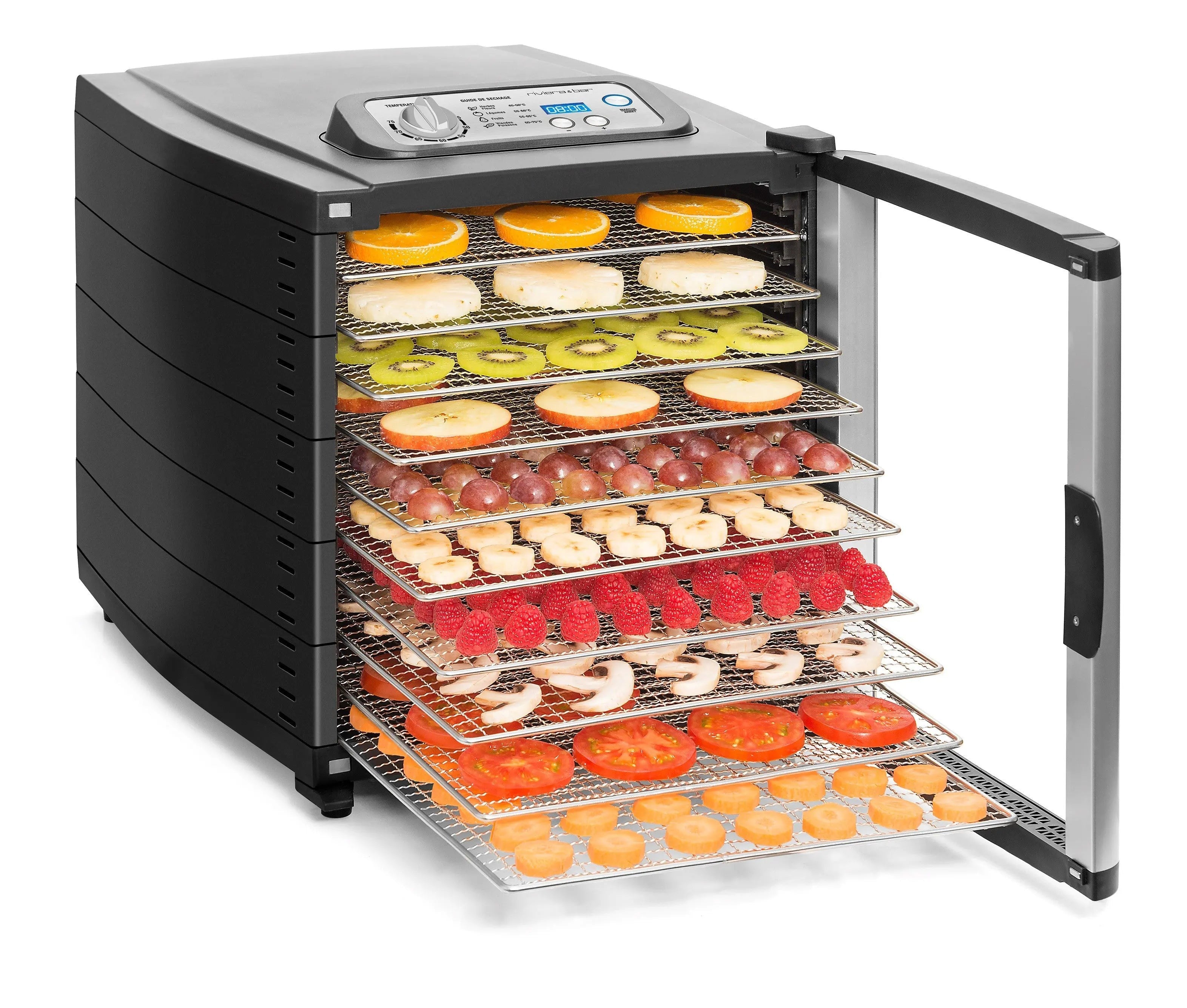 Zwarte voedseldroger met verschillende vruchten en groenten.