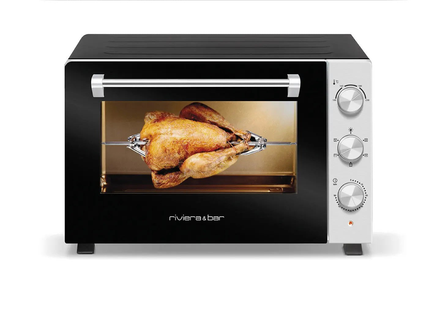 Elektrische oven met gebraden kip.