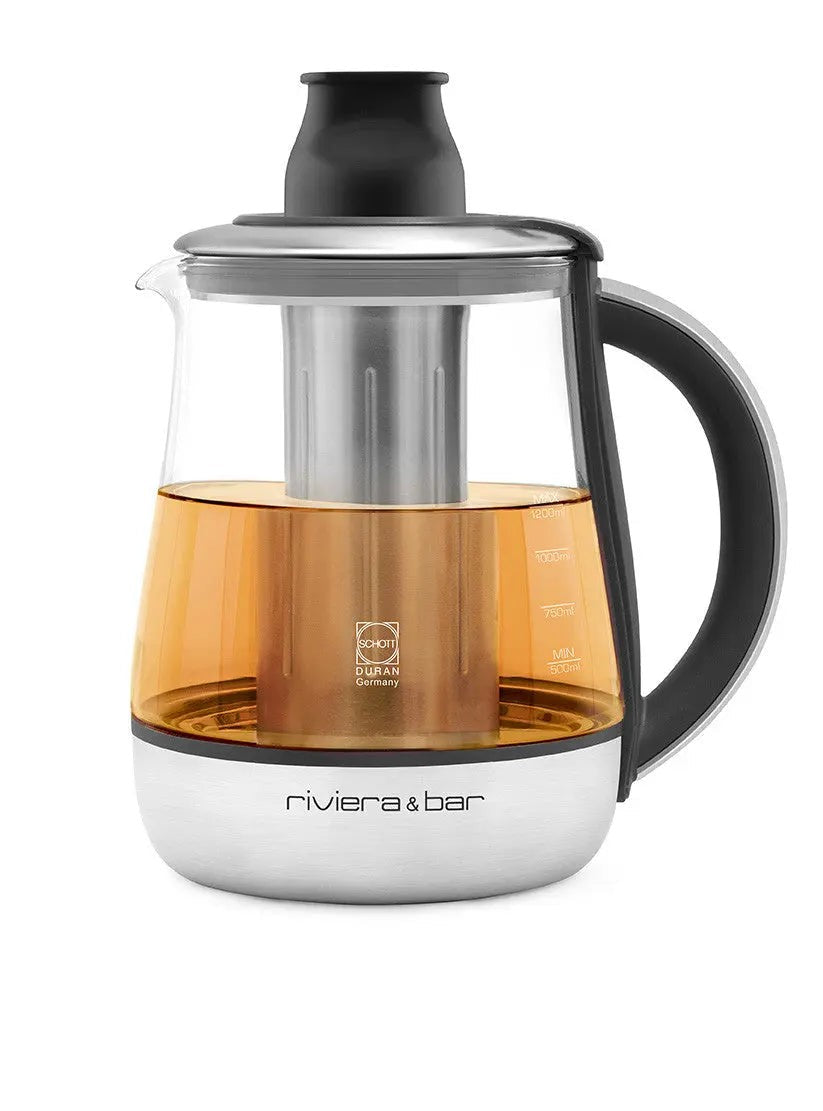 Theepot van glas en metaal.