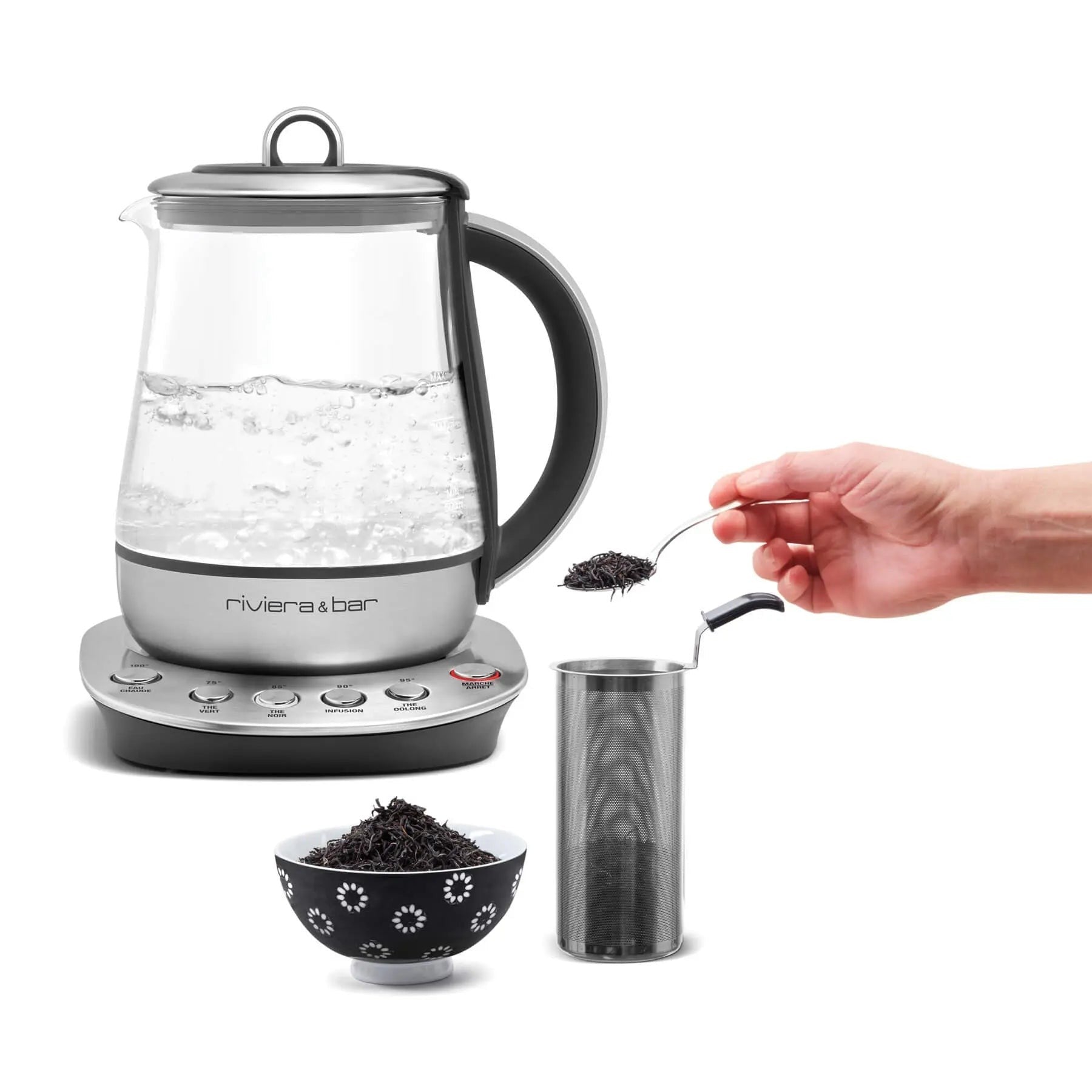 Waterkoker van glas en roestvrij staal, theepot met metalen thee-ei, losse zwarte thee.